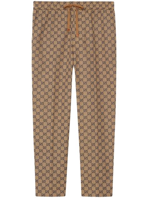 gucci pantaloni con bande laterali|Nuova collezione di pantaloni sportivi Gucci uomo su FARFETCH.